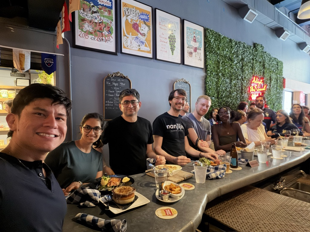 Lab members sharing a meal together at a restaurant.